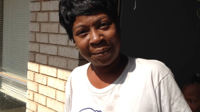 Sweet Brown wears white t-shirt