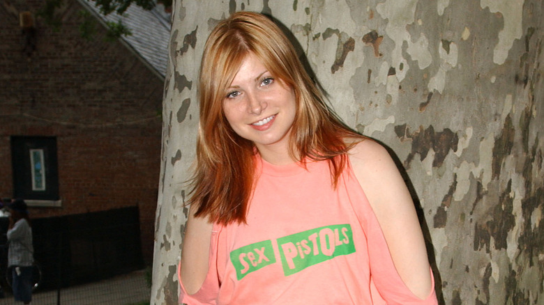 Vitamin C smiling and posing