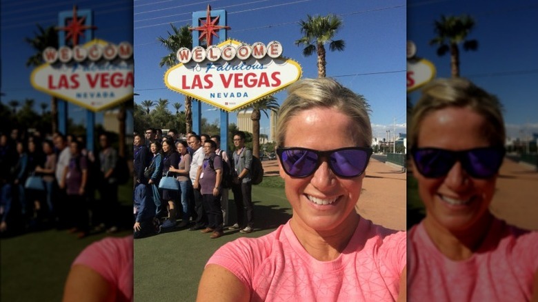 Martha MacCallum taking a selfie in front of the Las Vegas welcome sign