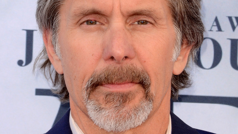 Gary Cole squinting slightly