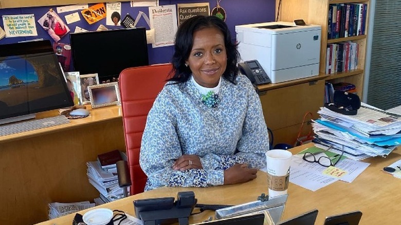 Mellody Hobson sitting at desk