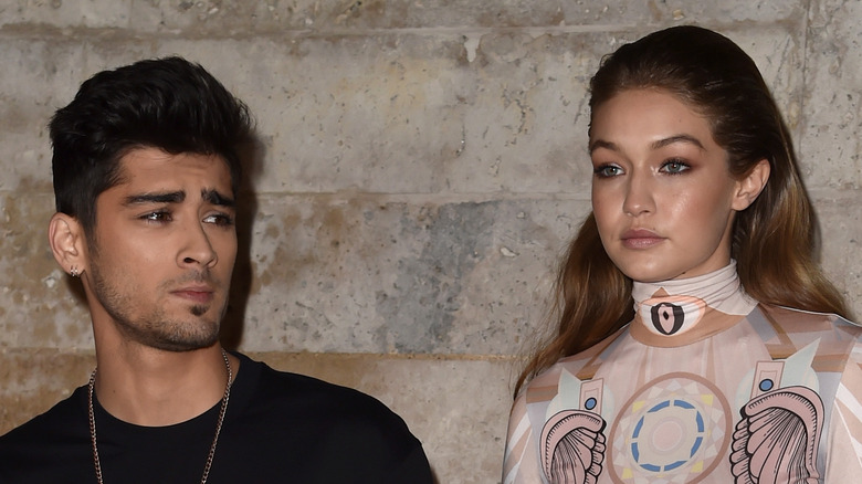 Zayn Malik and Gigi Hadid attend the Givenchy show
