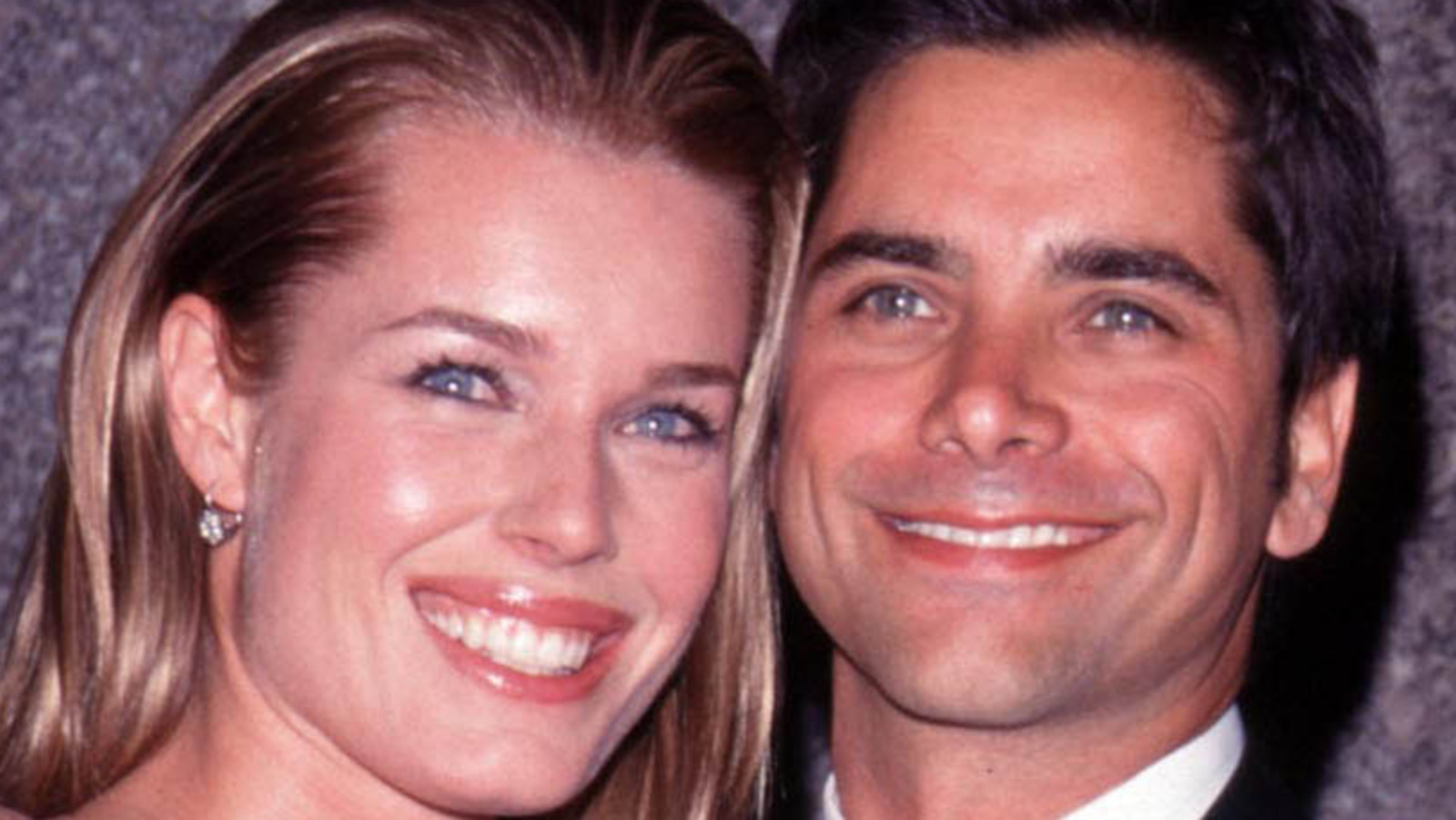 What Happened Between John Stamos And Rebecca Romijn?