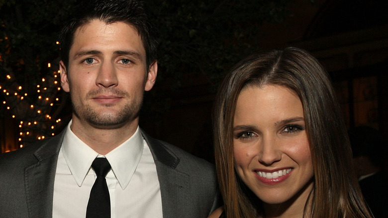 James Lafferty short beard Sophia Bush long hair smiling