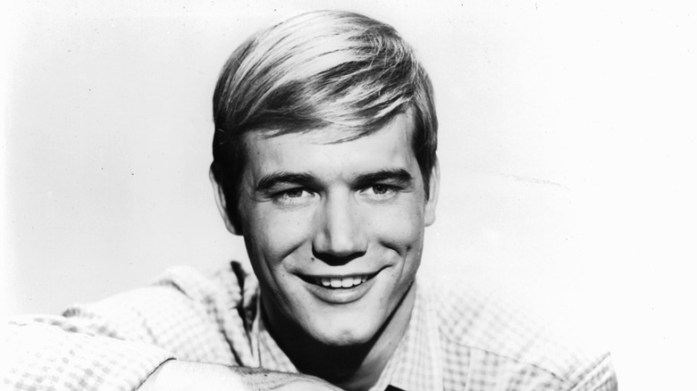 Roger Ewing posing for photoshoot in 1965