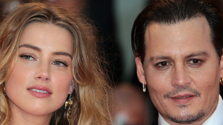 Amber Heard and Johnny Depp posing