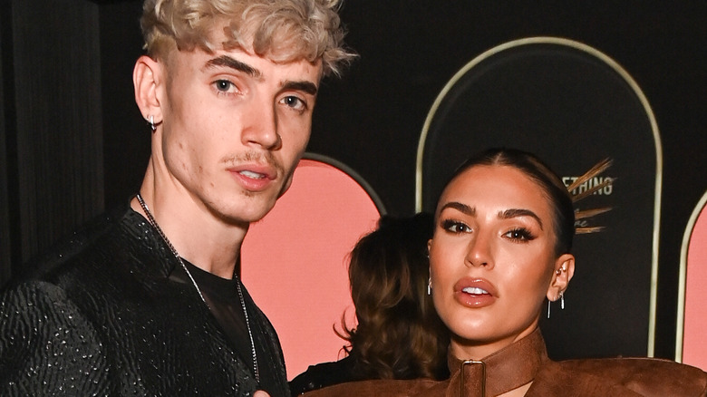 Emily Miller and Cam Holmes at an event 