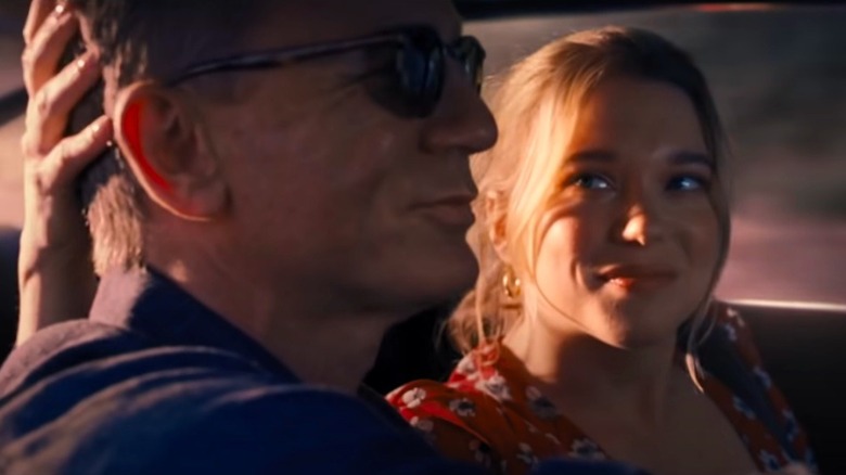 Lea Seydoux smiling at Daniel Craig