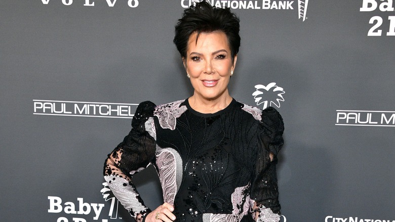 Kris Jenner poses at an event