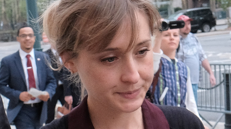 Allison Mack walking outside