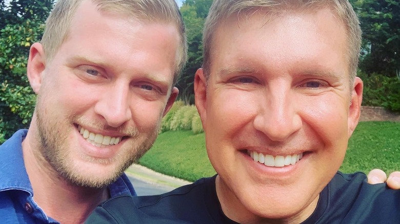 Kyle and Todd Chrisley smiling