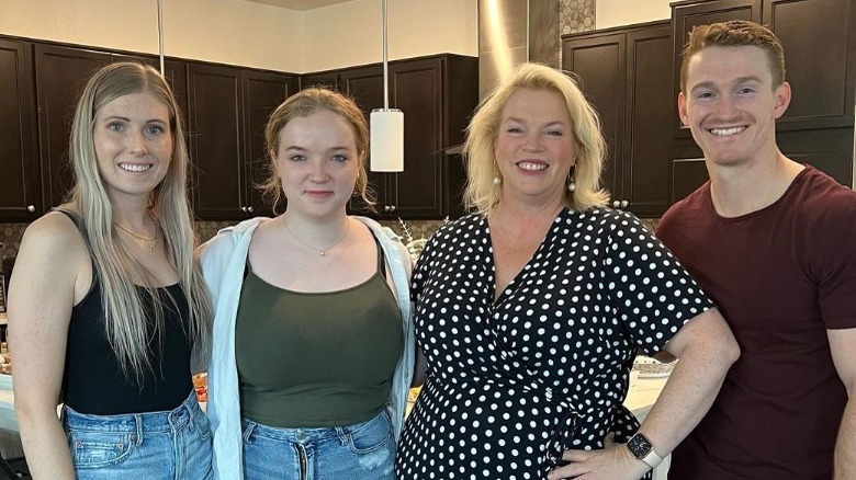 Logan Brown with Janelle and Michelle Petty
