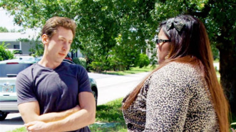 Mike and Felicia standing on her driveway