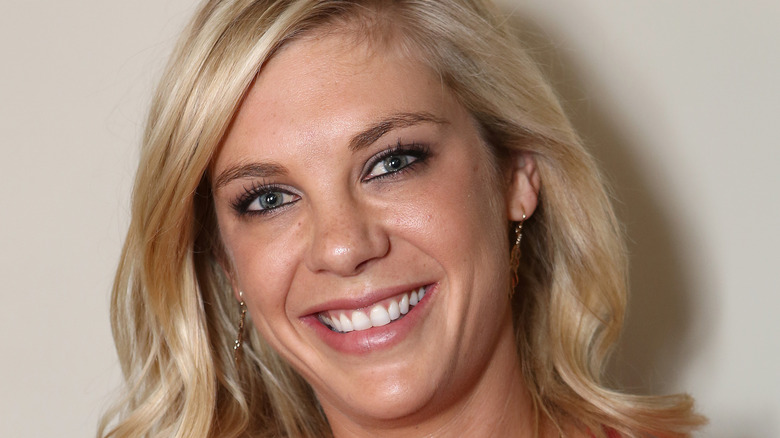 Chelsy Davy smiling for photo