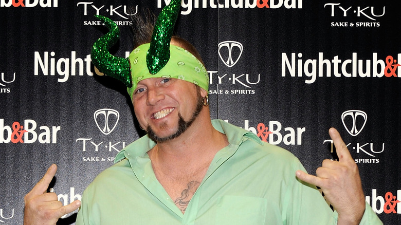 Horny Mike of Counting Cars wearing bedazzled horns on the red carpet
