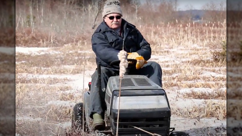 Dave Blankenship riding a tractor