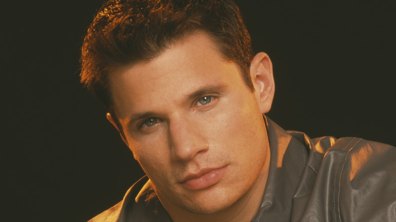 Nick Lachey posing for 98 Degrees shoot