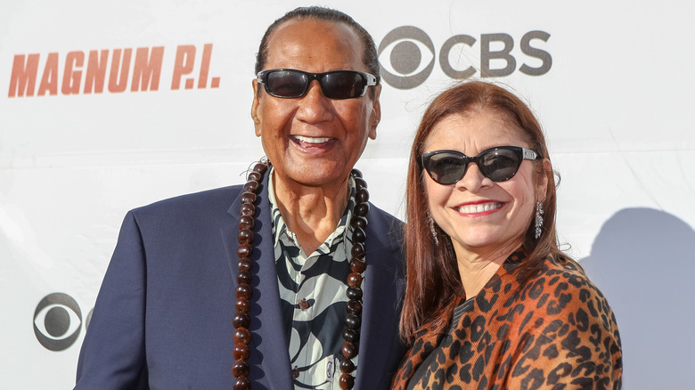 Al Harrington and his wife pose at the 2018 Sunset on the Beach event celebrating both "Hawaii Five-0" and "Magnum P.I."