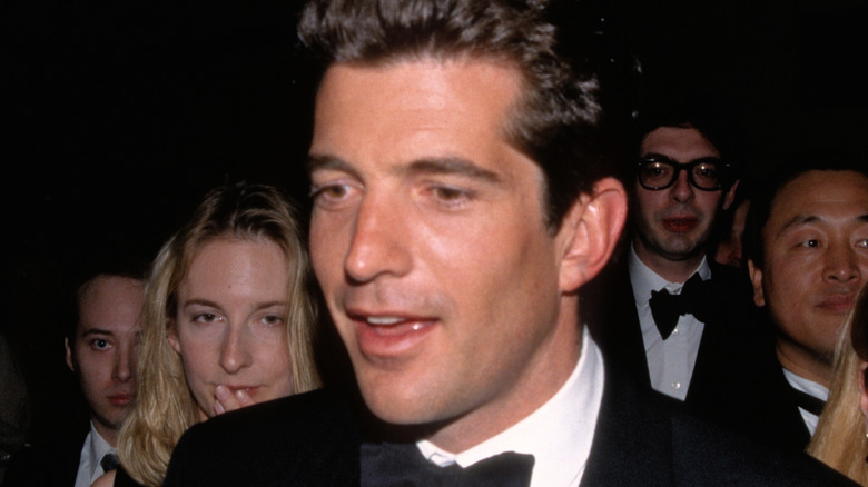 John F. Kennedy Jr. at a party