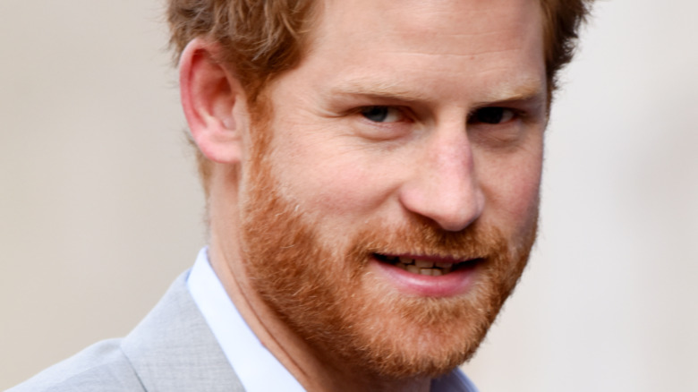 Prince Harry staring uncomfortably into the camera