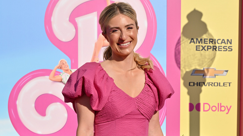Jasmine Roth wearing a pink dress with puffy sleeves