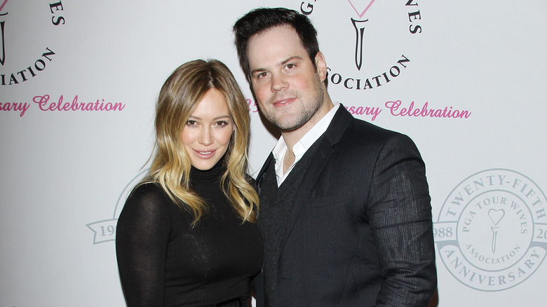 Hilary Duff and Mike Comrie posing