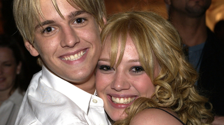 Hilary Duff and Aaron Carter smiling