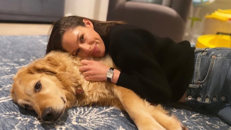Abby Huntsman cuddling dog