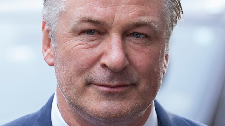 Alec Baldwin smirking