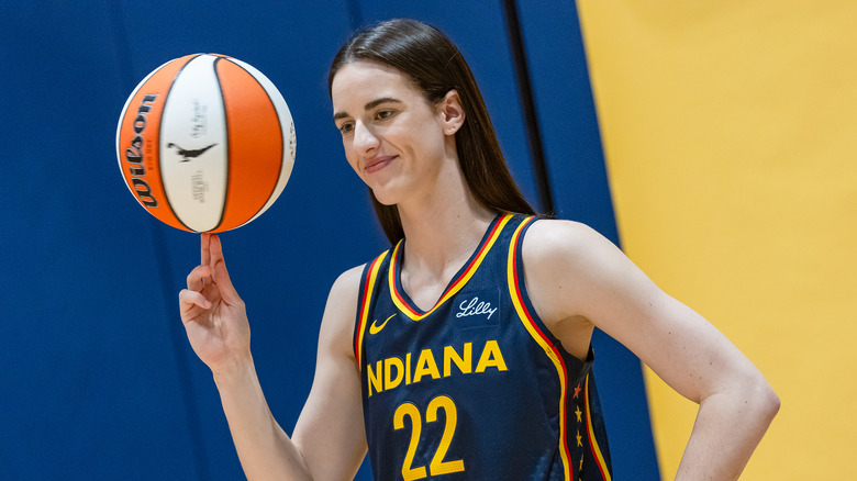 Caitlin Clark spinning basketball