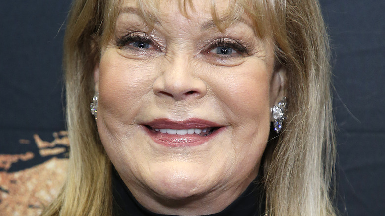 Candy Spelling smiling