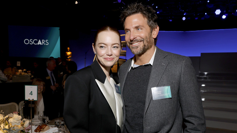 Emma Stone and Bradley Cooper smiling