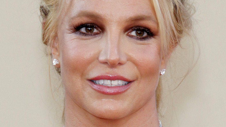 Britney Spears smiling on the red carpet