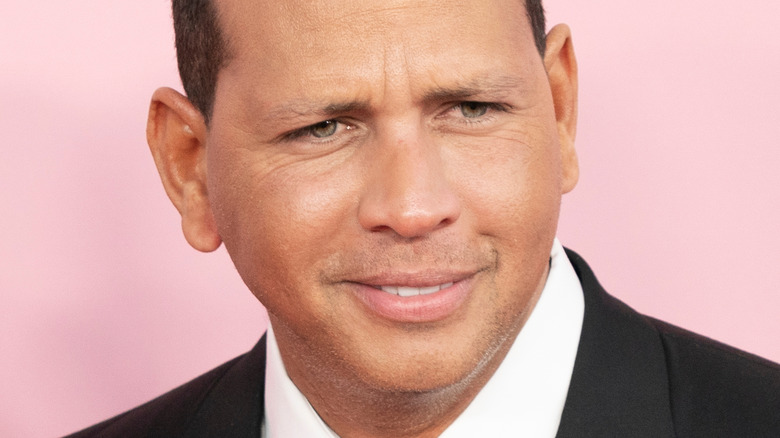 Alex Rodriguez smiling and looking to the side