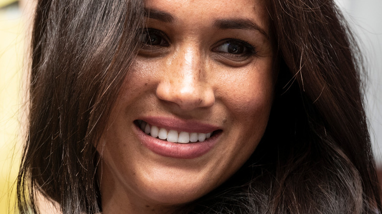 Meghan Markle attends a tennis match