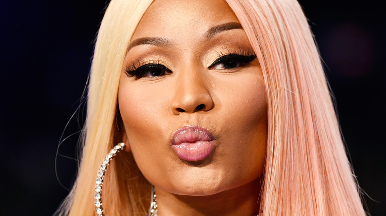 Nicki Minaj blowing a kiss.