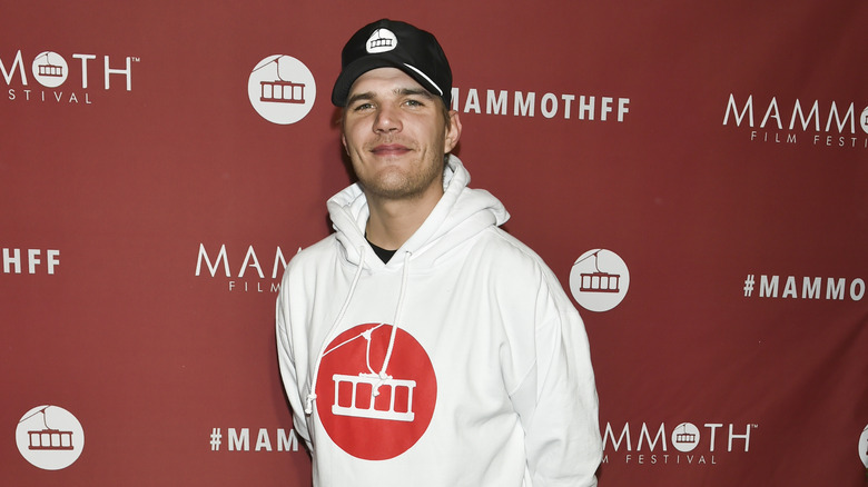 Chris Zylka attending premiere event