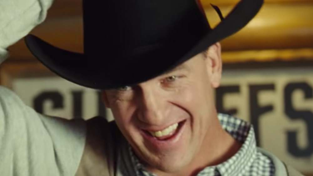 Peyton Manning with a cowboy hat on