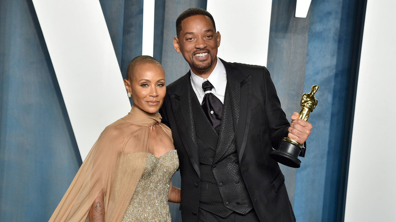 Jada Pinkett Smith and Will Smith posing