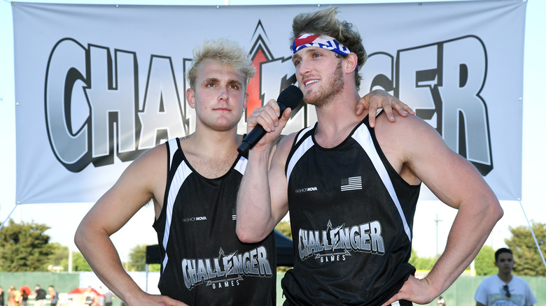 Jake and Logan Paul at an event