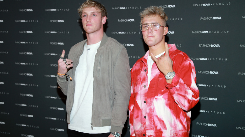 Jake and Logan Paul posing