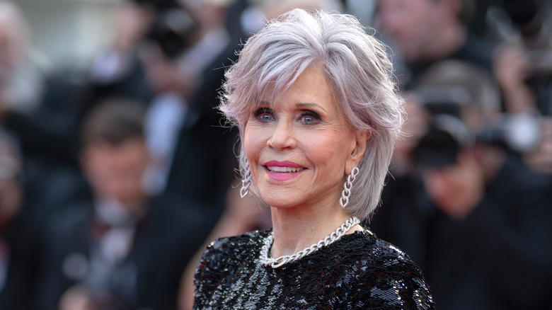Jane Fonda poses in black sequined gown