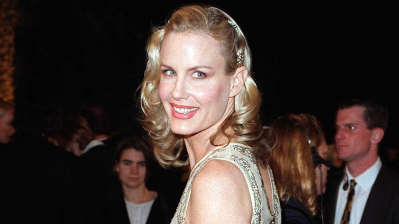 Daryl Hannah smiling at a 1990s party.
