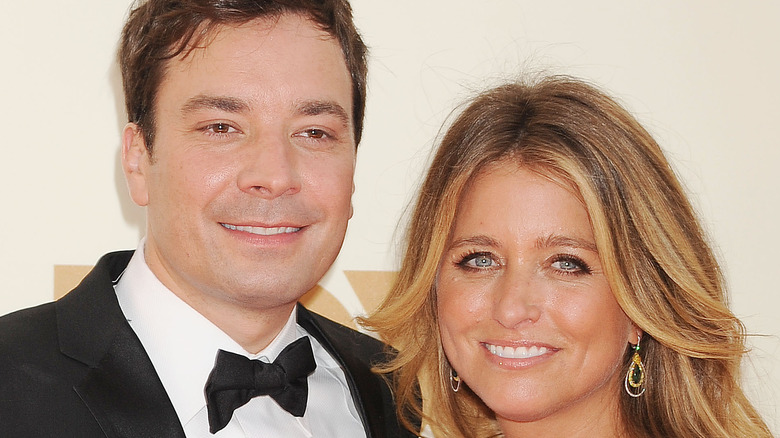 Jimmy Fallon and Nancy Juvonen smile at an event