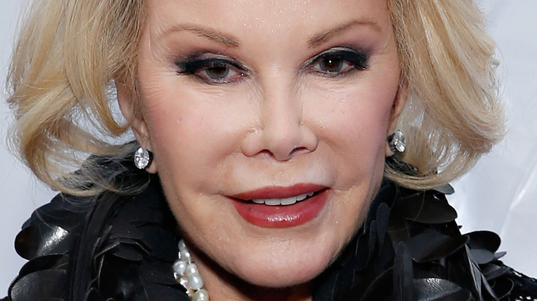 Joan Rivers posing in 2014