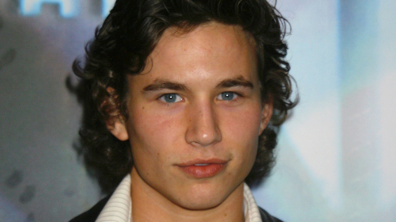 Jonathan Taylor Thomas with curly hair.
