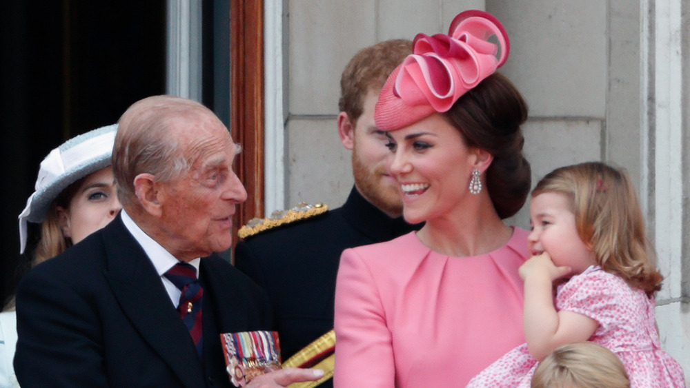 Prince Philip and Kate Middleton laugh on the balcony of Buckingham Palace 
