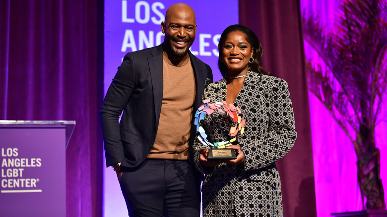 Keke Palmer and Karamo Brown smiling