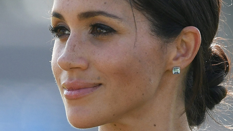 Meghan Markle grinning