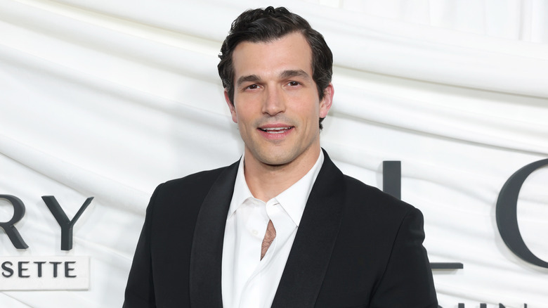 Paul Anthony Kelly undone dress shirt clean shaven